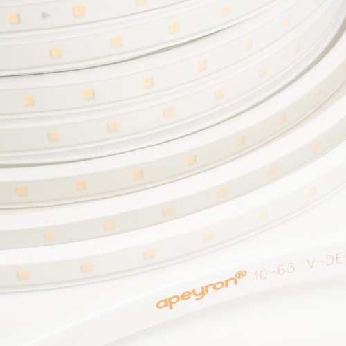 Светодиодная влагозащищенная лента Apeyron 6W/m 60LED/m 2835SMD теплый белый 50M 10-63 Светодиодная влагозащищенная лента Apeyron 6W/m 60LED/m 2835SMD теплый белый 50M 10-63